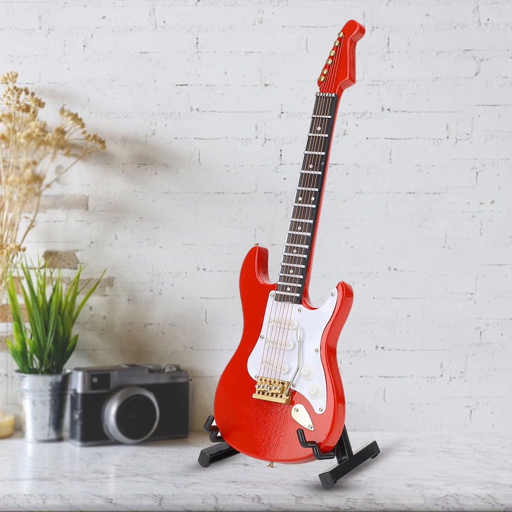 Miniatuur rode elektrische git - Musical Instrument ____ recensie en prijs